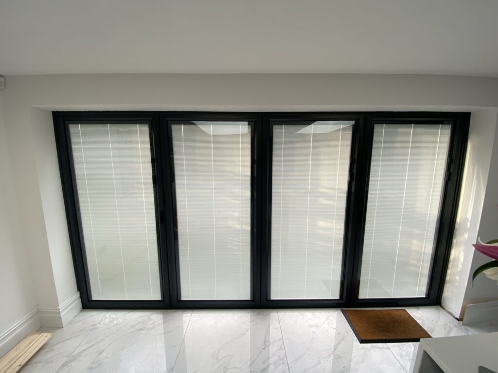 aluminium-bifold-doors-with-built-in-blinds