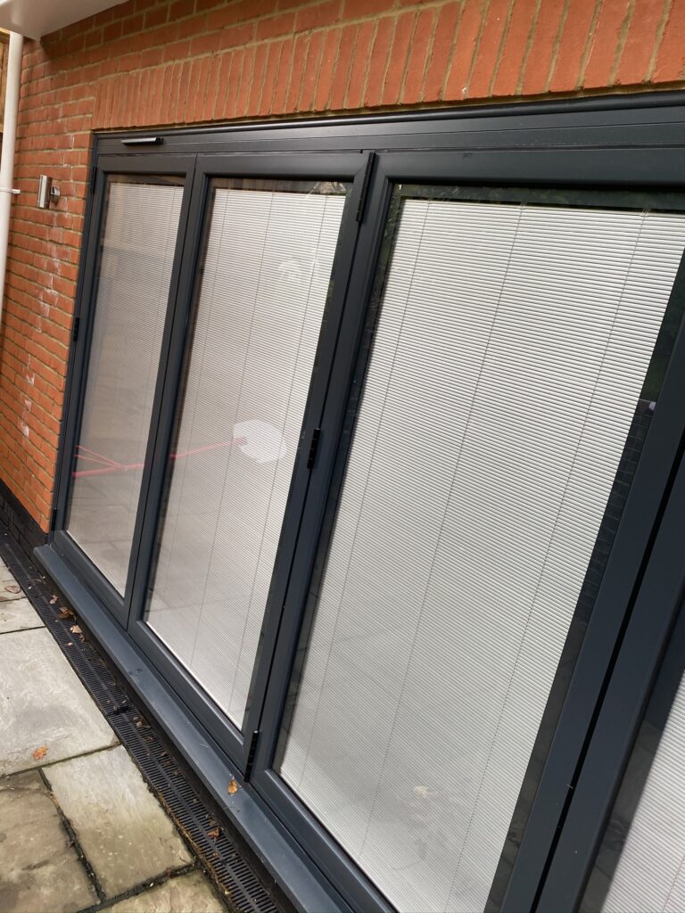bifold-doors-with-blinds-in-glass