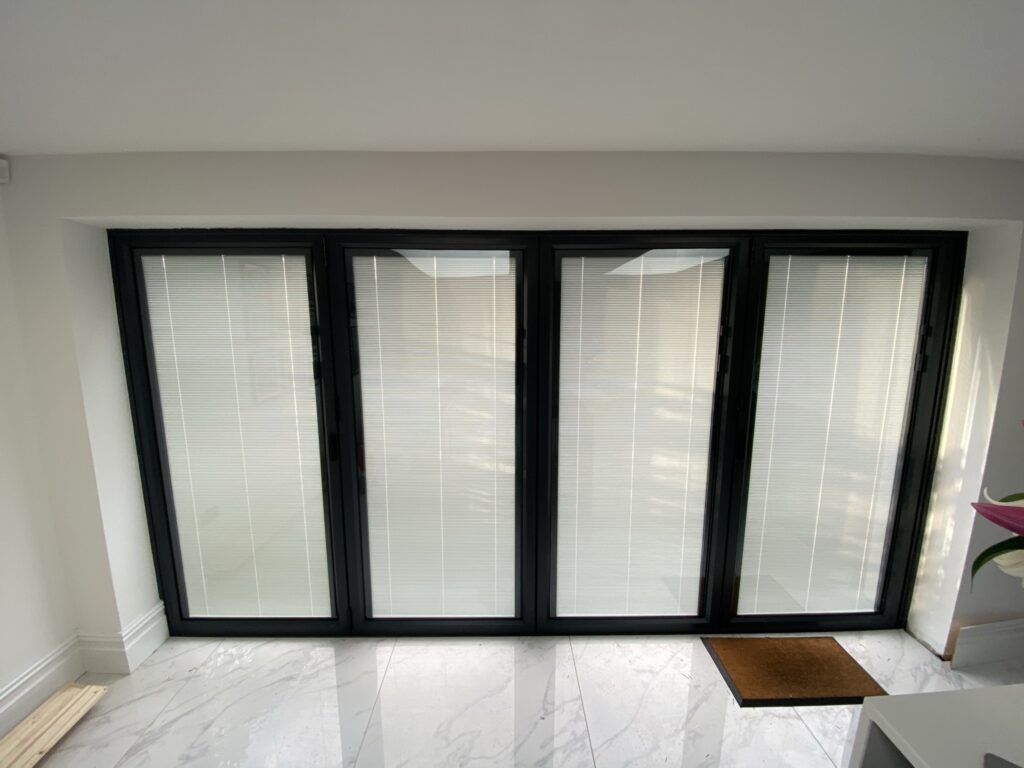 bifold-doors-with-blinds-inside-glass
